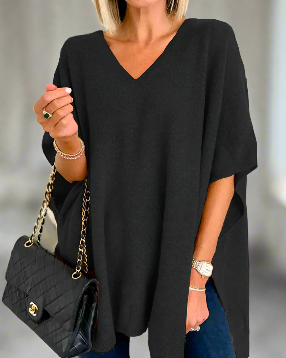 Elara | Blød strikket ponchosweater med V-hals